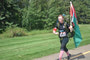 Sergeant Gerri Anne Davidson is proudly flying ‘the colours’ while finishing the race with her Dr.Seuss speed socks.